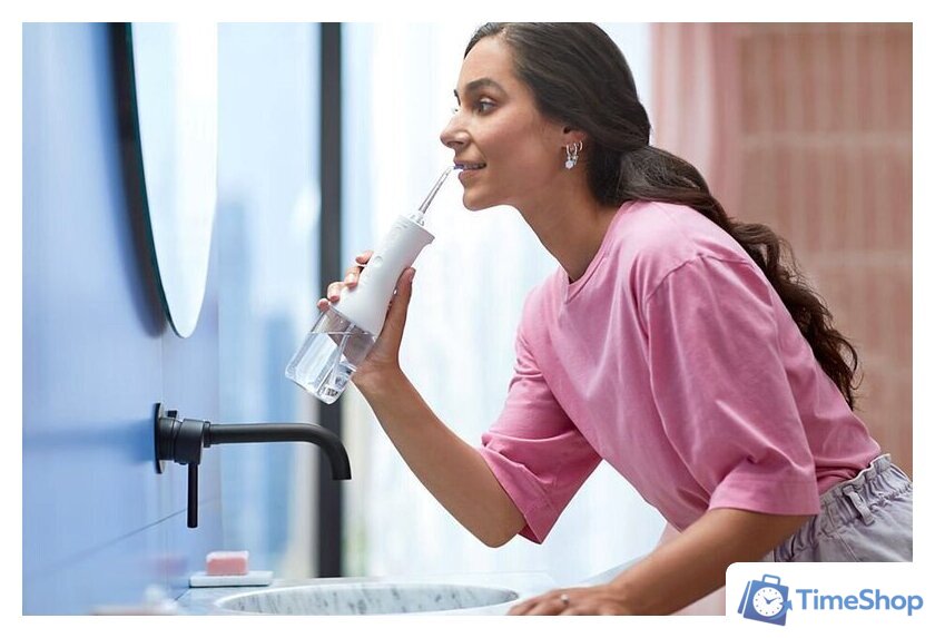 Электрическая зубная щетка и ирригатор Philips Sonicare Cordless Power Flosser HX3886/41 - Изображение №4 — Интернет-магазин Time-Shop