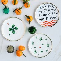 Тарелка десертная Bitossi La Tavola Scomposta FTB00263 (большой клевер/божья коровка) - Превью изображения №3 — Интернет-магазин Time-Shop