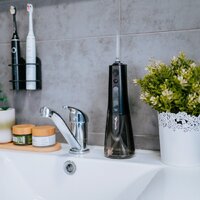 Ирригатор  TrueLife AquaFloss Compact L100 (черный) - Превью изображения №11 — Интернет-магазин Time-Shop